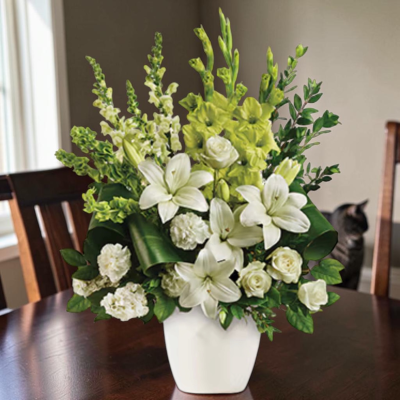 Nova - Large display of white and green flowers, open lilies, roses, gladioli, snapdragons, carnations arranged with a large ceramic pot.